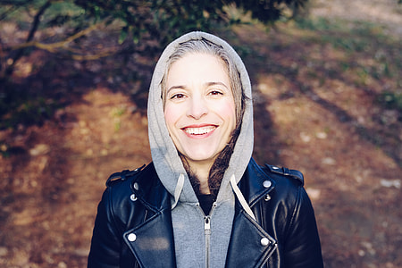 photo of woman wearing black leather jacket thumbnail