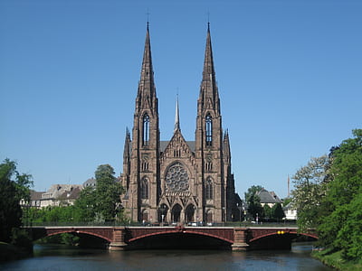 cathedral near body of water during daytime thumbnail