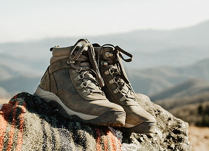pair of gray hiking shoes on rock thumbnail