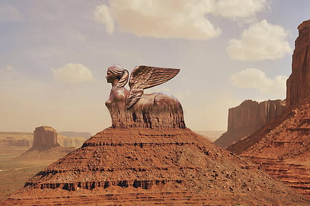 woman with wings rock formation thumbnail