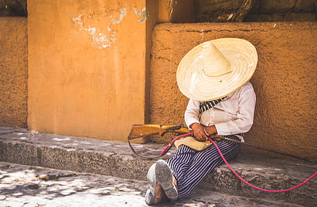 person sleeping while holding rifle outdoor thumbnail