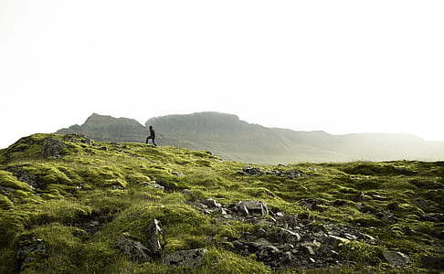 landscape photography of person standing on clip thumbnail