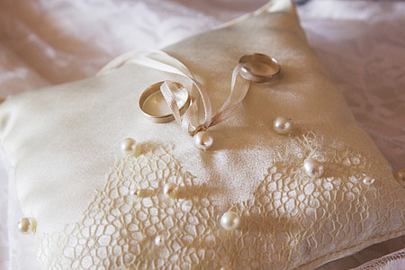 wedding band on pillow thumbnail