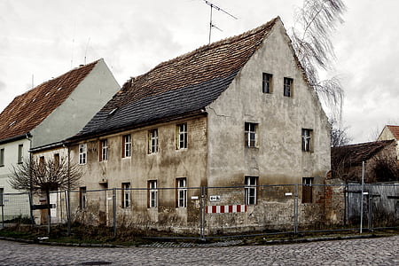 white concrete building beside beige concrete building thumbnail