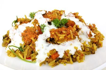 cooked rice with white sauce on white plate thumbnail