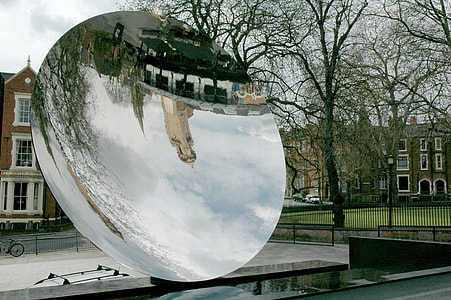 Nottingham Playhouse and Roman Catholic Cathedral reflected in Anish Kapoor's Sky Mirror in England thumbnail