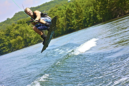 man wakeboarding during daytime thumbnail