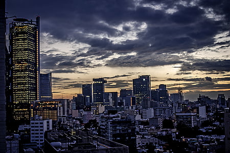 aerial photography of high-rise buildings under white cloudy skies thumbnail