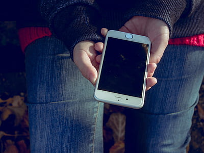 person holding silver iPhone thumbnail