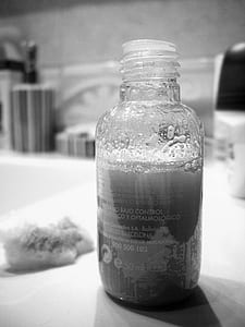 grayscale photo of plastic bottle thumbnail