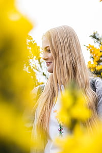 woman smiling and lookingg eastwest thumbnail