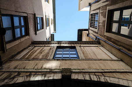 low angle photography of building at daytime thumbnail