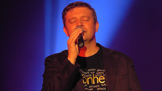 man holding microphone thumbnail