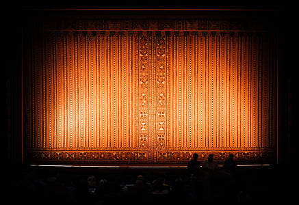 people gathering in theater thumbnail