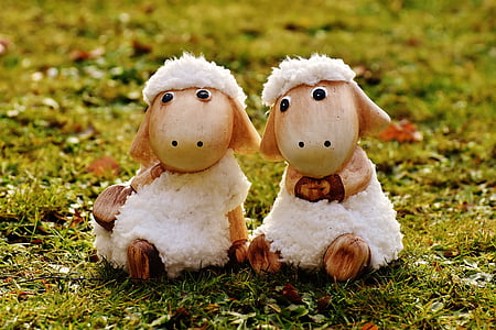 two white sheep decors on green grass thumbnail