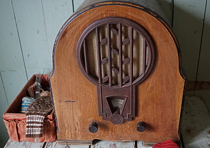 brown cathedral radio beside brown basket thumbnail
