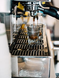 selective focus photo of glass cup filling on coffee thumbnail