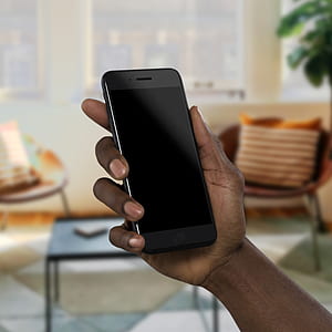 person holding space gray iPhone 8 thumbnail