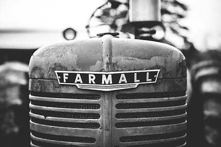 grayscale photo of gray tractor thumbnail