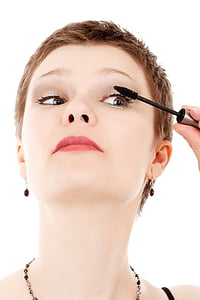 woman holding mascara thumbnail