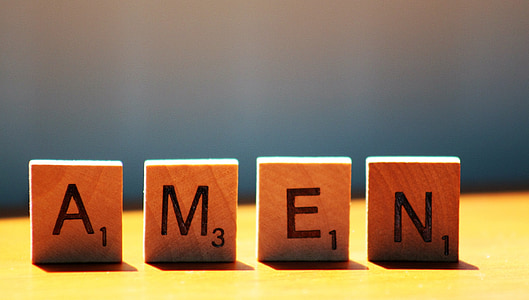 four scrabble pieces thumbnail