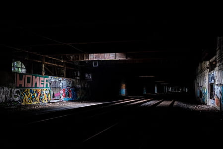 dark empty room with graffiti thumbnail