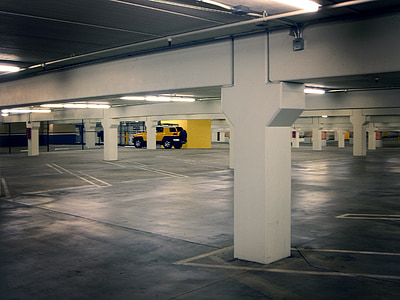 yellow Toyota FJ Cruiser parked on underground parking lot thumbnail