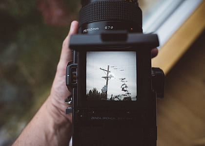 black camera at photo of electric post thumbnail