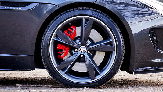 grey vehicle with black wheels and red calipers thumbnail