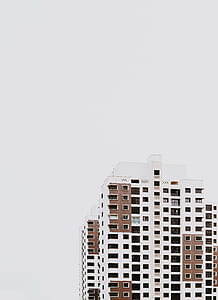 aerial photography of white and brown building thumbnail