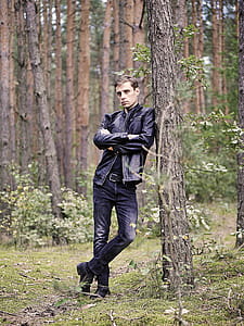 Man Standing Beside Tree thumbnail