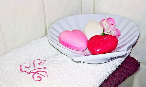 white ceramic bowl on white towel thumbnail