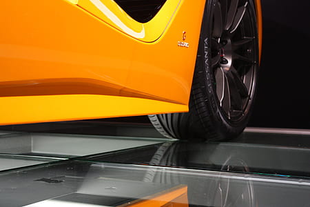 close-up photo of orange vehicle thumbnail