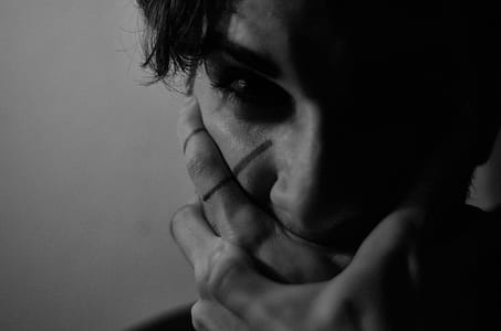 Grayscale Photography of Man's Face thumbnail