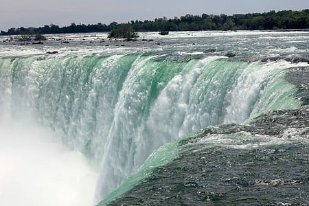 aerial photography of waterfalls at daytime thumbnail