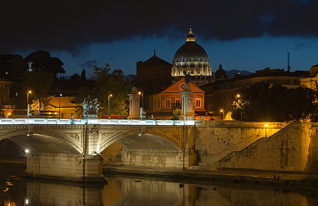 brown concrete bridge during nighttime thumbnail