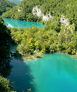 aerial view of island with body of water thumbnail