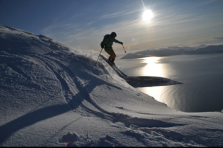 person skiing on snow-covered field thumbnail
