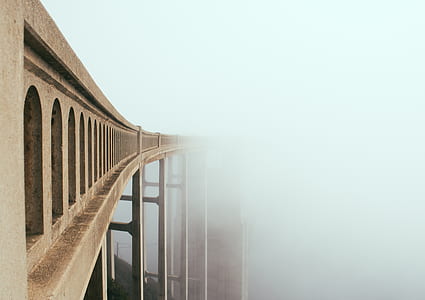 architectural photography of brown bridge thumbnail