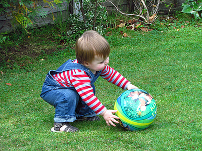 child playing ball outside thumbnail