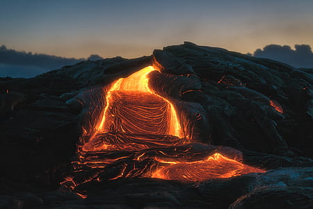 lava flowing downwards during sunrise thumbnail