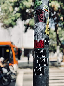gray pole with stickers thumbnail
