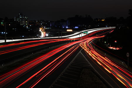 time lapse photography of road way during nighttime thumbnail