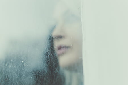person near foggy glass window thumbnail