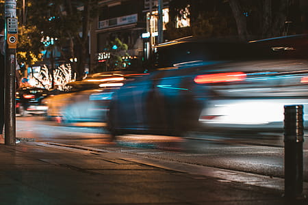 Time-lapse Photography of Silver Car Passed by on Road thumbnail