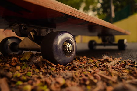 Brown Skateboard on Ground thumbnail