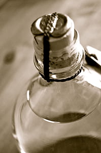 clear glass bottle with clear liquid thumbnail