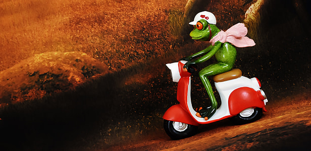 frog riding motorcycle figurine thumbnail