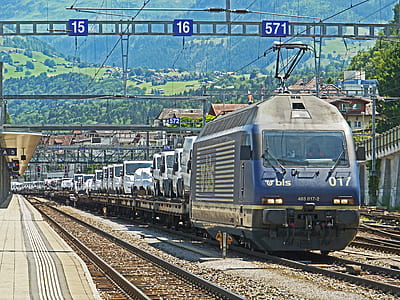 vehicle on blue and gray train thumbnail