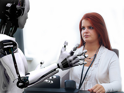 woman in white cardigan in front of robot thumbnail